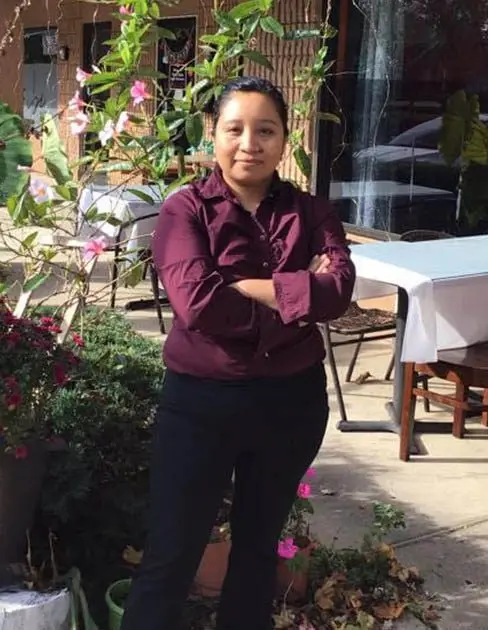 One of the owners of El Mariachi San Lucas on the garden patio